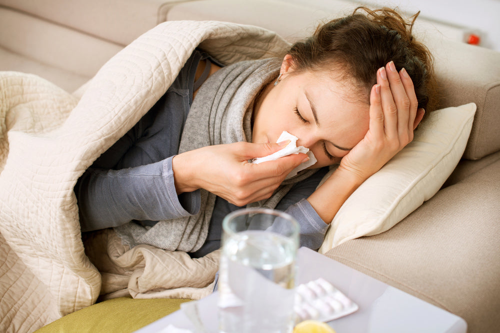 woman sick in bed