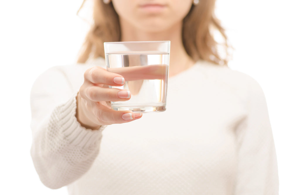 woman with cup of salt water