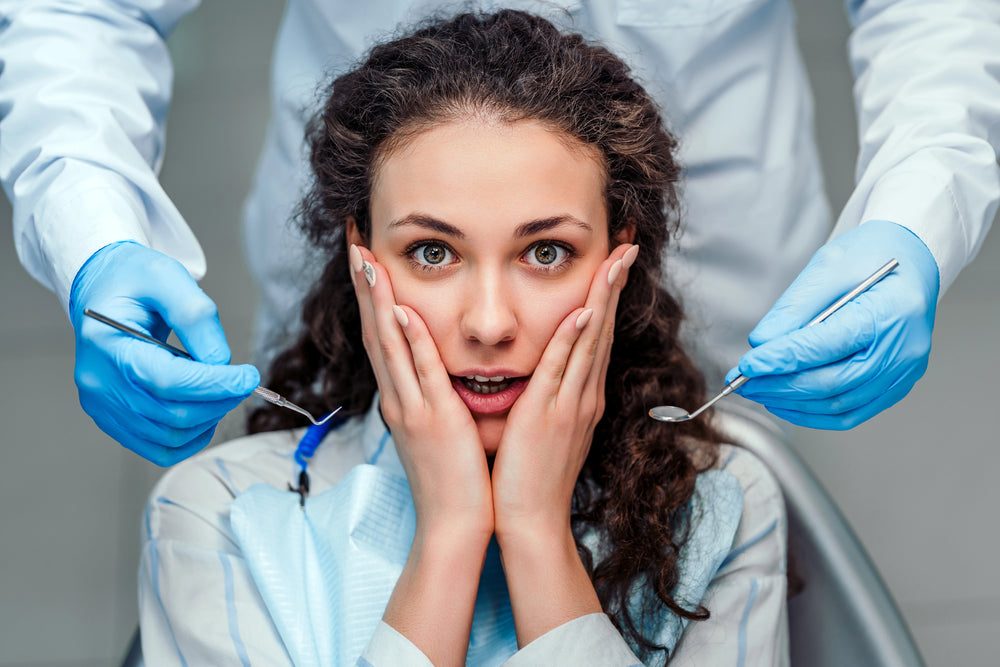 woman afraid of dentist